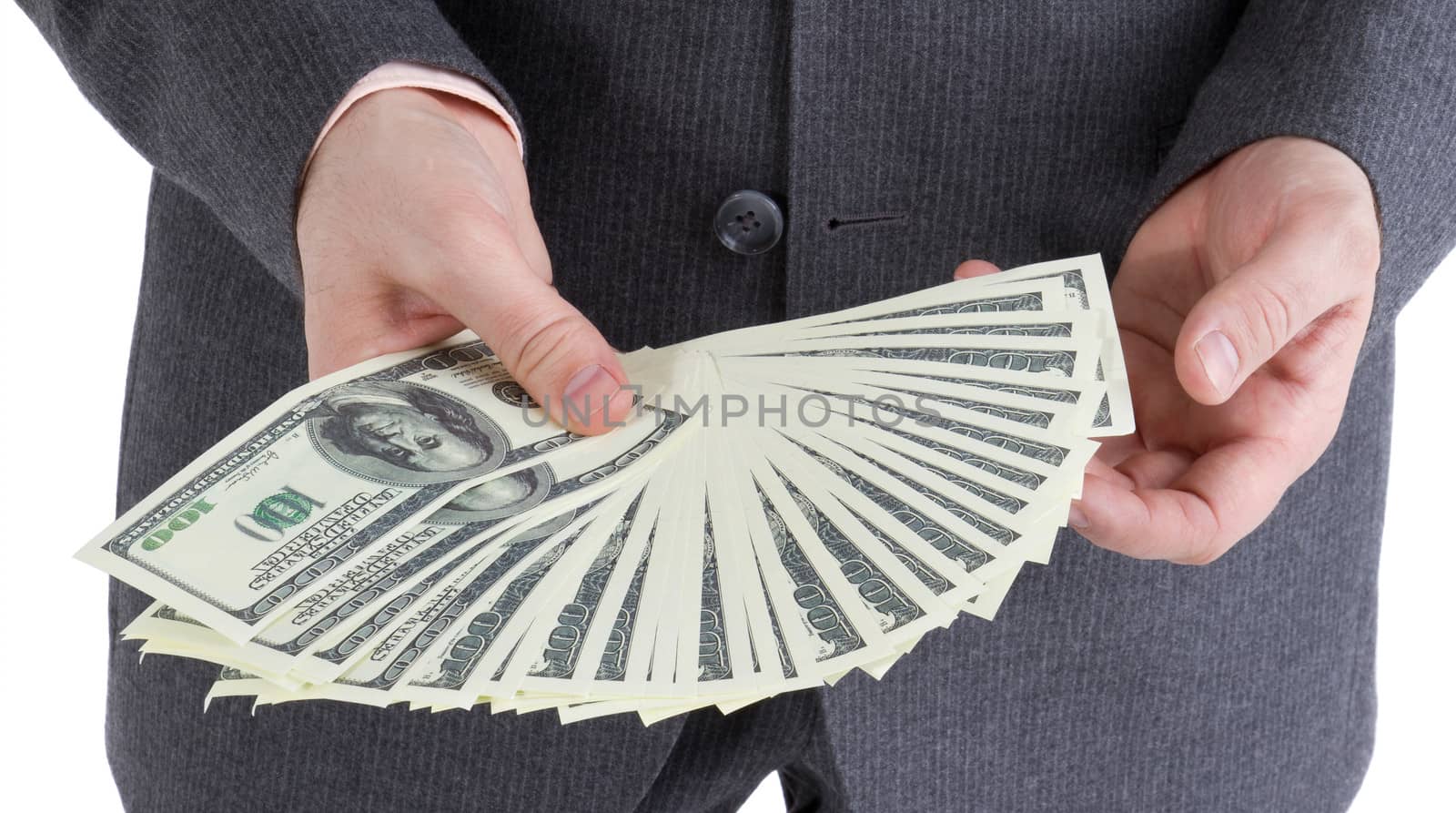 stack banknotes of 100 dollars in male hands on a white background