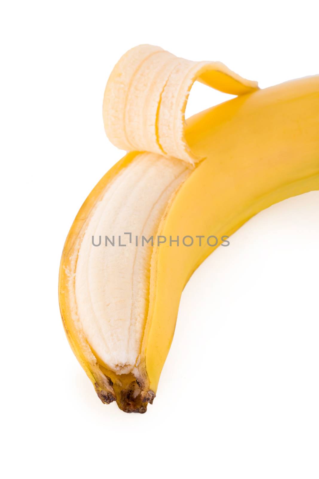 Ripe peeled banana closeup, fruit isolated on white
