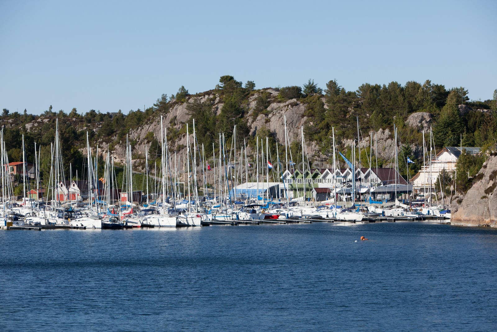 The picture shows somewhere in Norway with mountains and fjords.