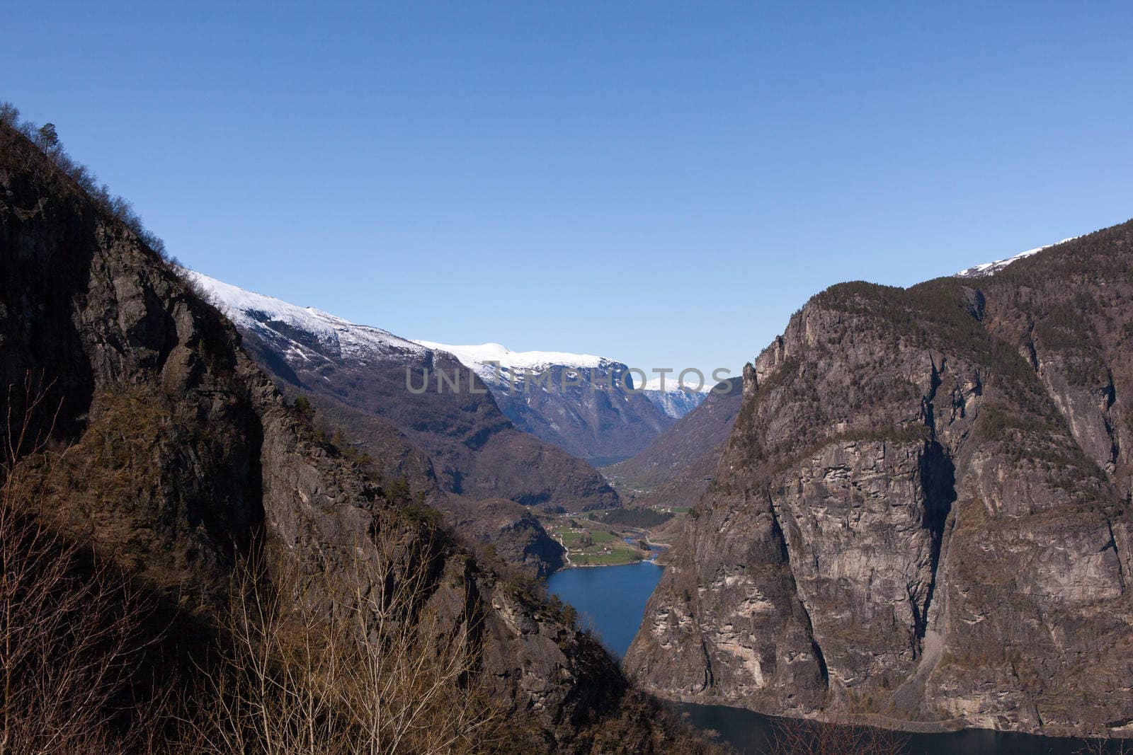 The picture shows somewhere in Norway with mountains and fjords.