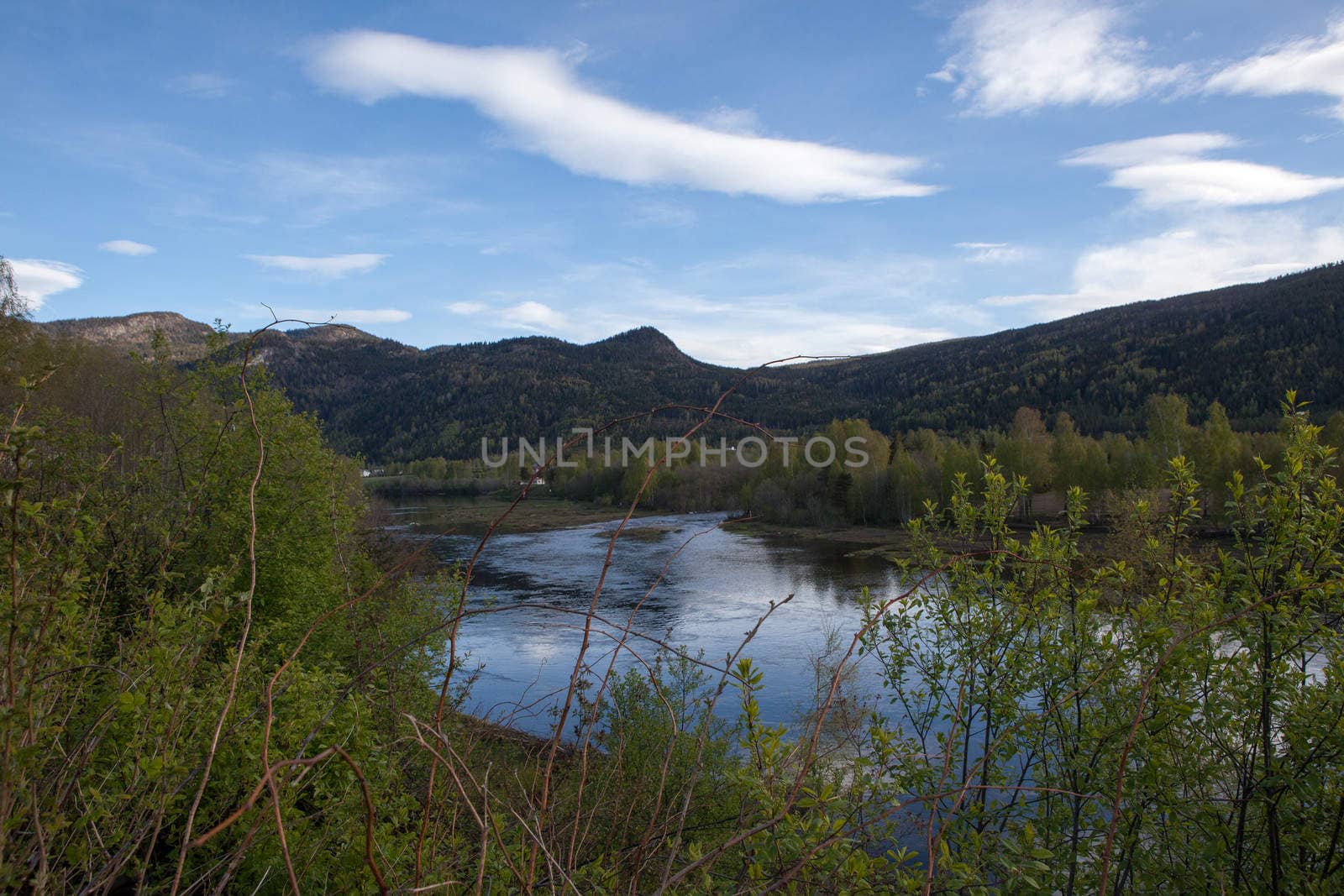 The picture shows somewhere in Norway with mountains and fjords.