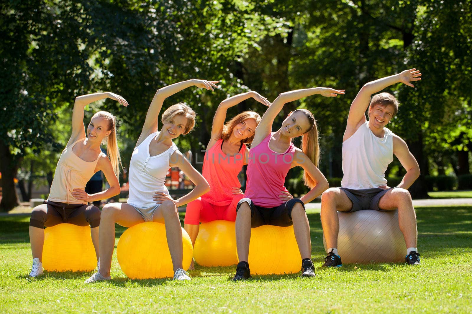 Young caucasians working out in a park by rufatjumali