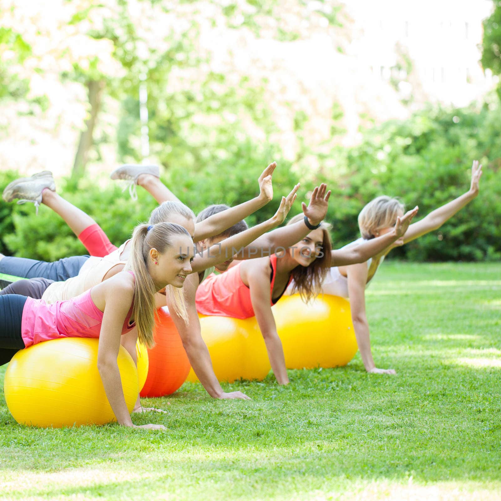 Young caucasians working out in a park by rufatjumali