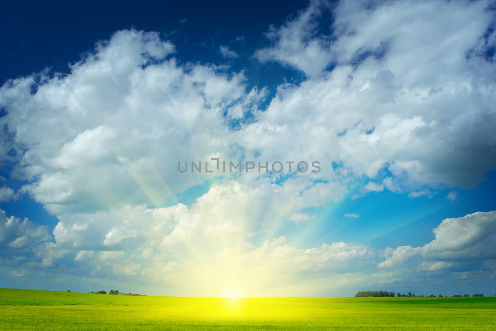 beauty Sunrise on a field with cloudy sky