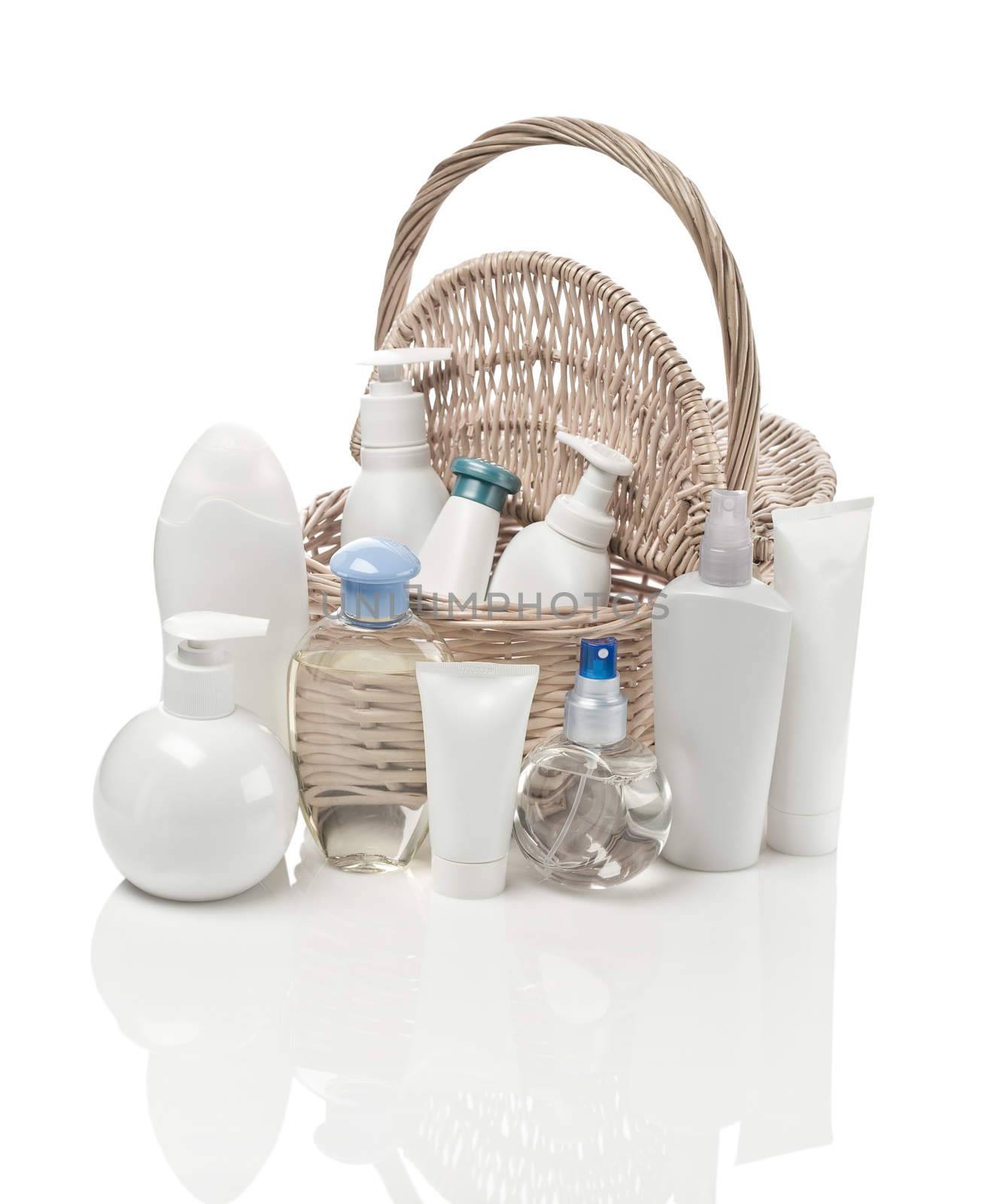 basket with sprays, bottles and tubes