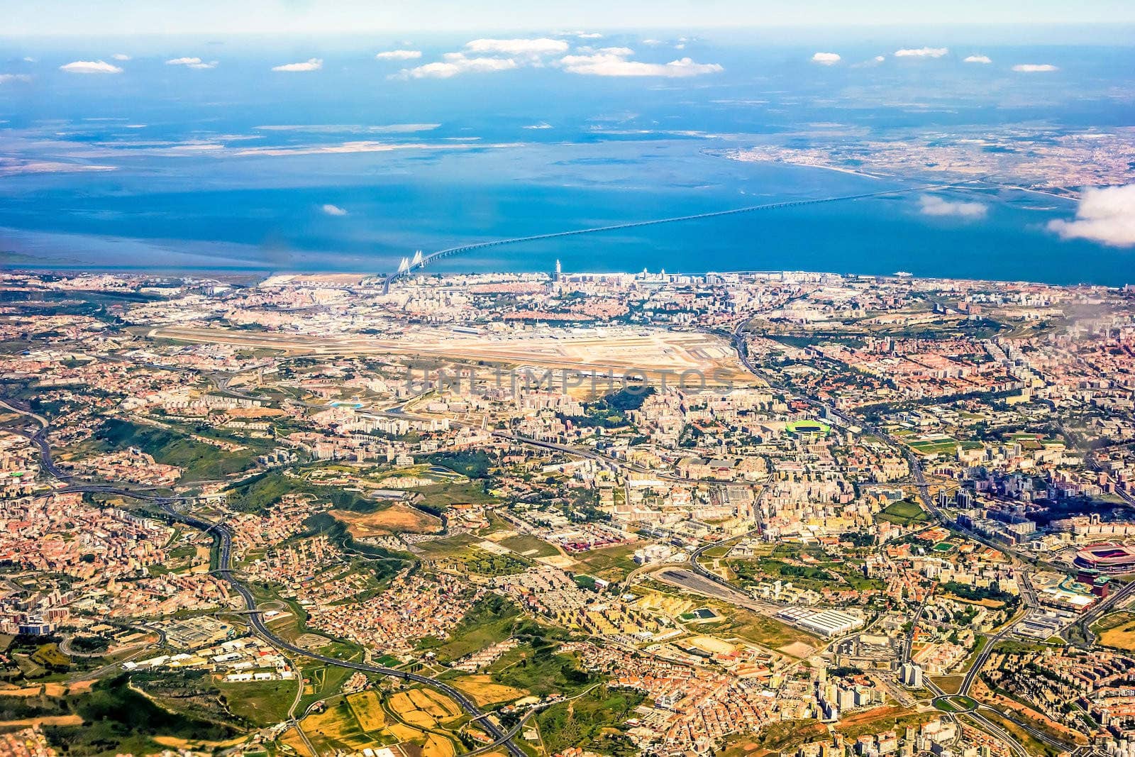 View over Lisbon, Portugal with airport, ponte vasco da gama, river tejo