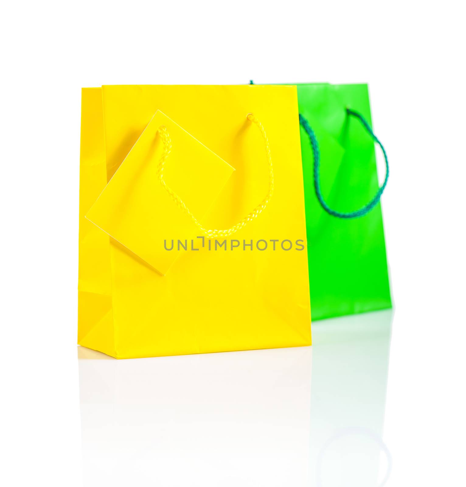 yellow and green paper bag isolated