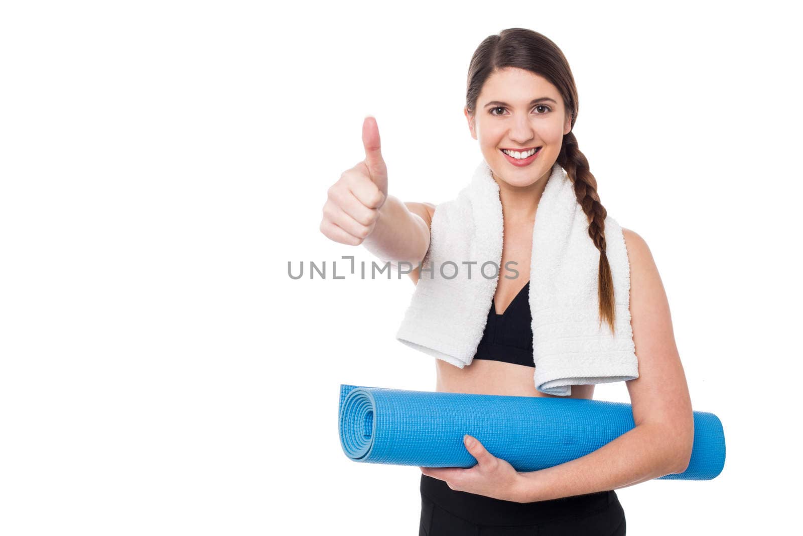 Smiling female trainer gesturing thumbs up