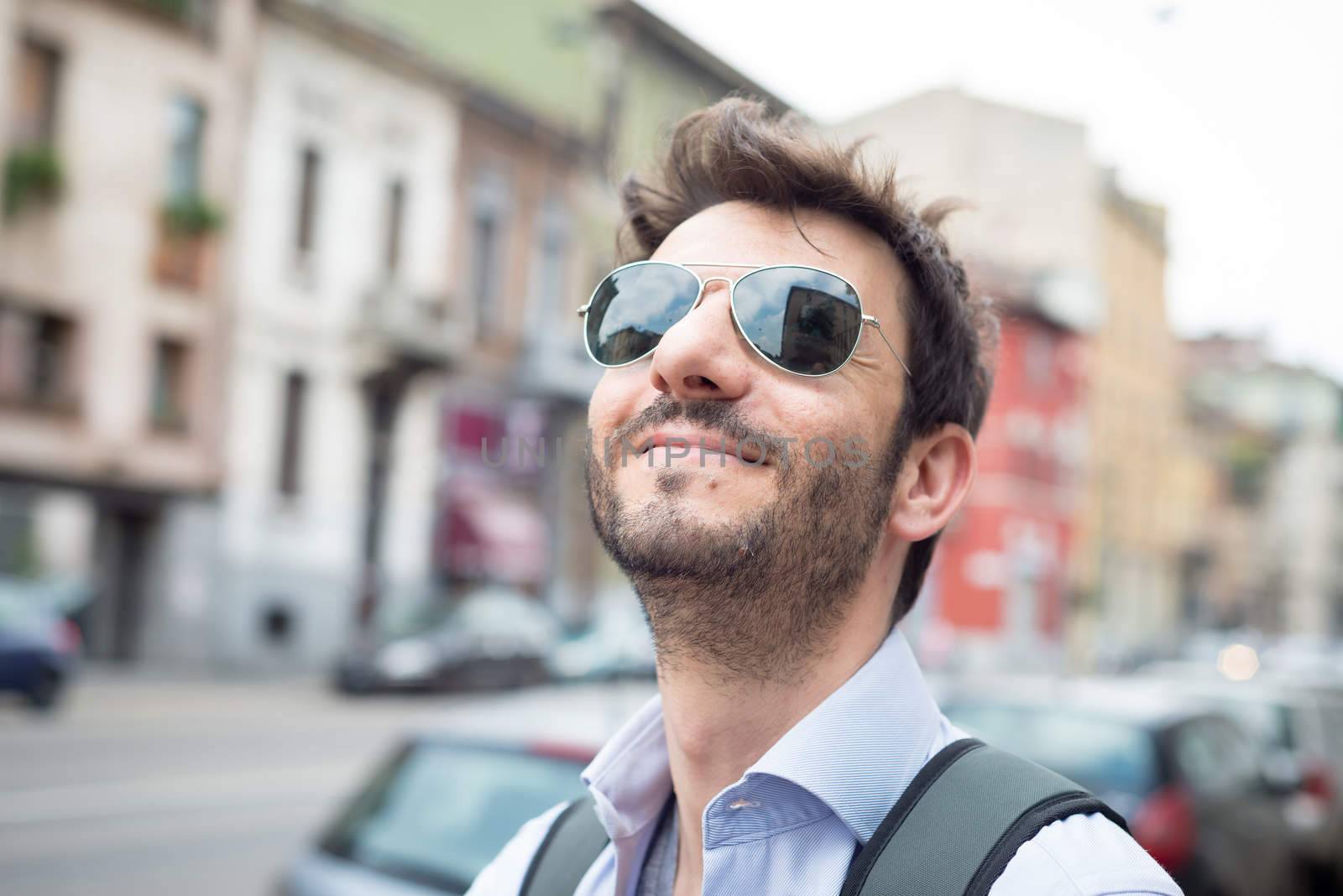 man walking in the street in the morning