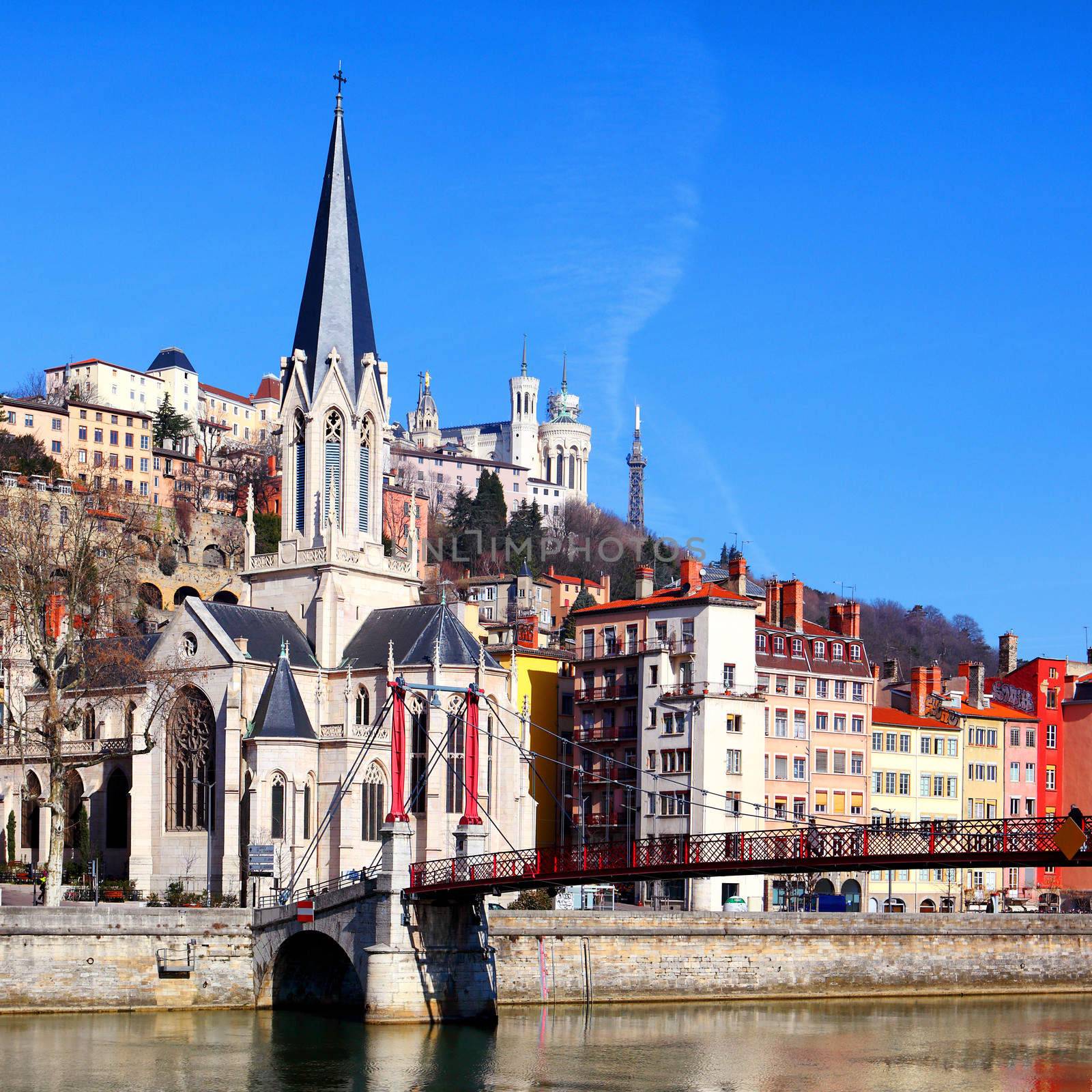 Lyon cityscape from Saone river with footbridge by vwalakte
