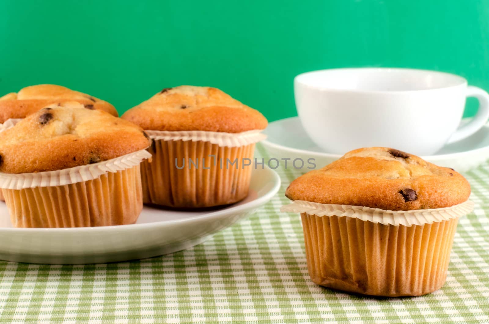 Fresh muffins on the table.