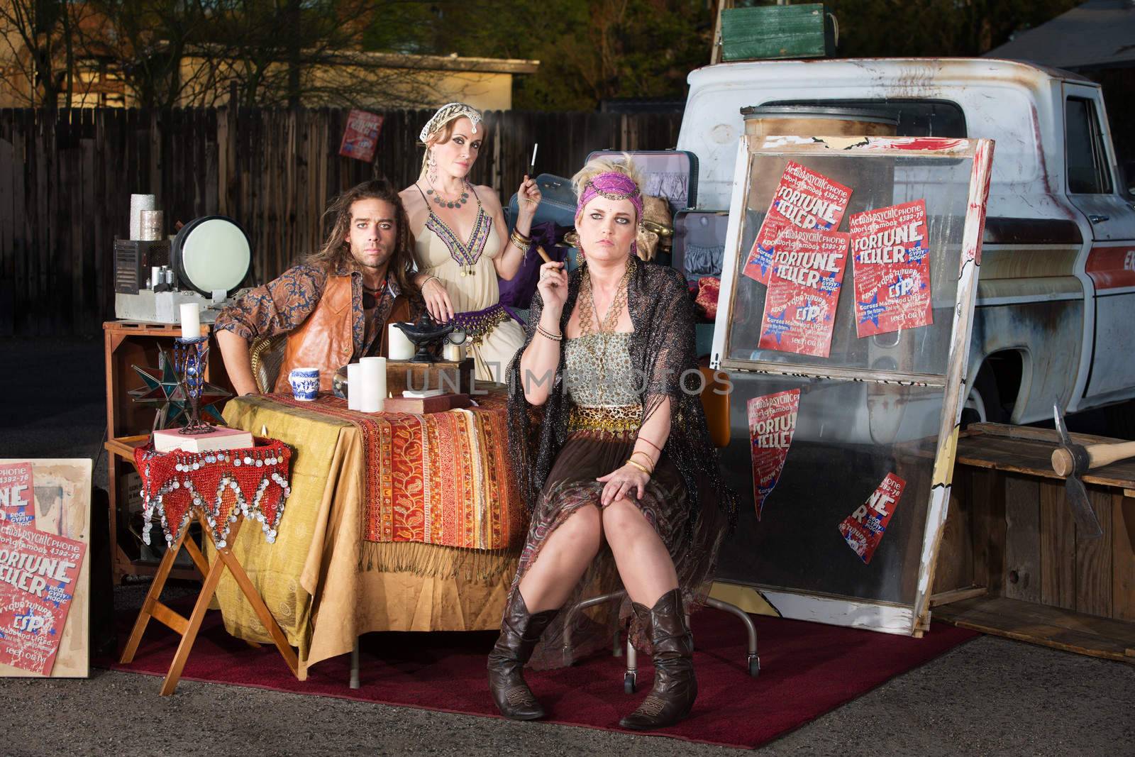 Gypsy travellers with truck and table outside
