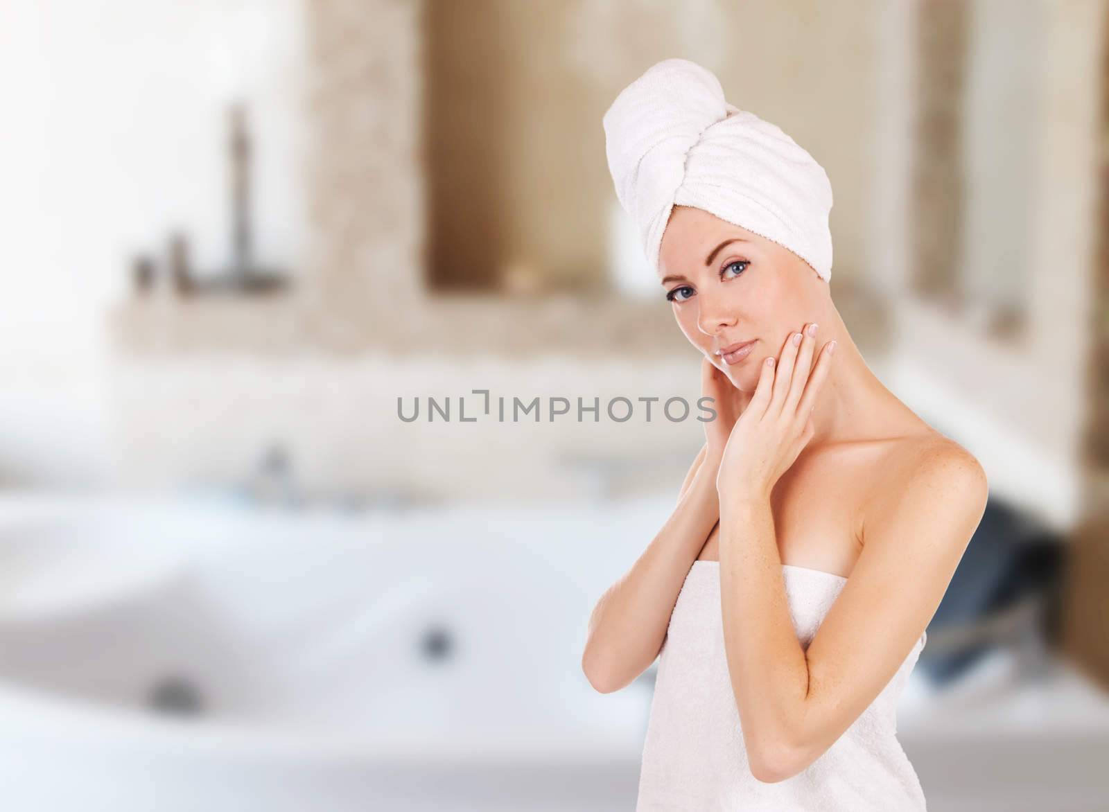 Woman with towel in bathroom with jacuzzi by Angel_a