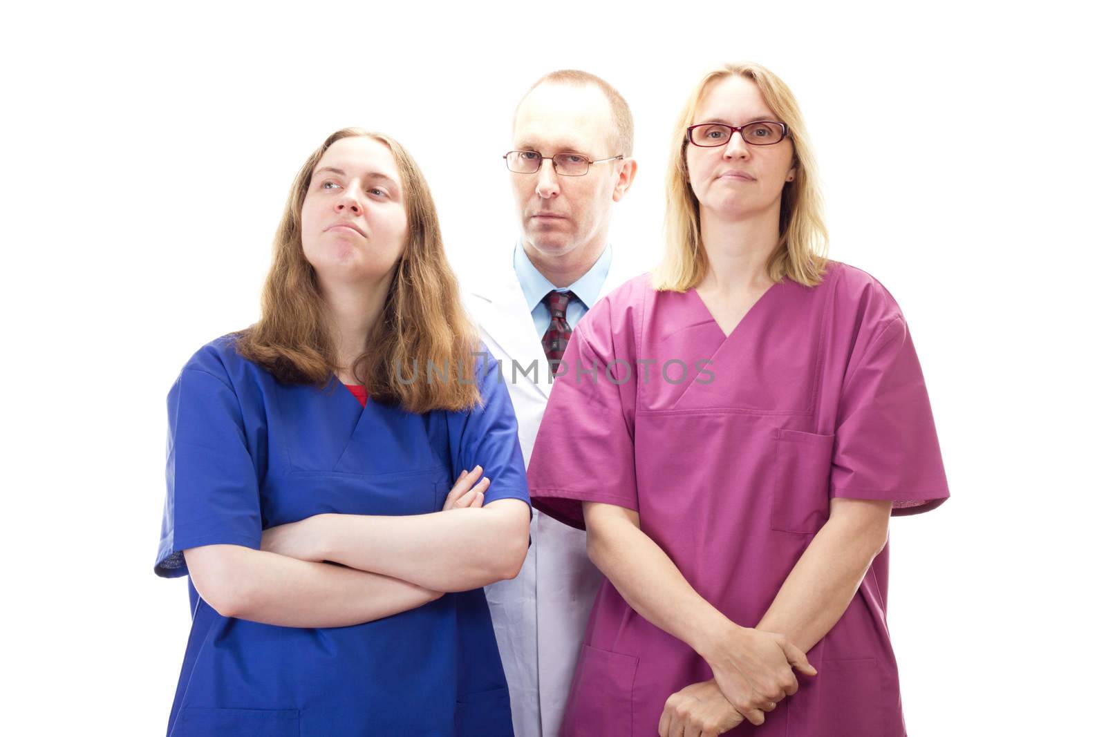 Professional medical doctor team waiting for next patient by gwolters