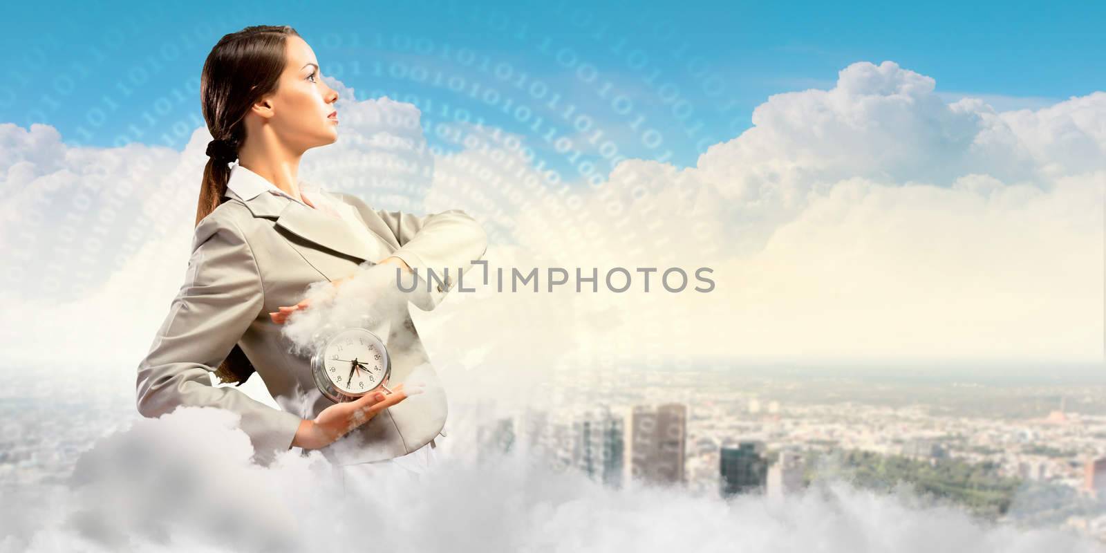 Image of young businesswoman holding alarmclock against illustration