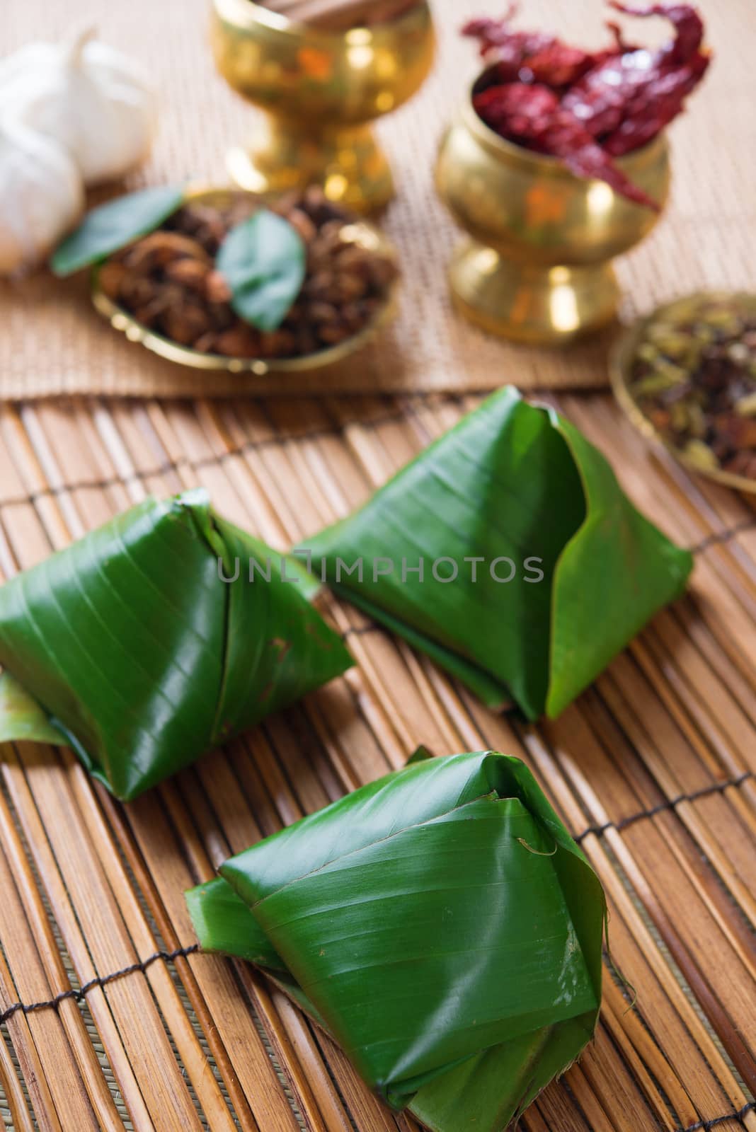Nasi lemak, popular traditional Malaysian food wrapped with banana leaf.