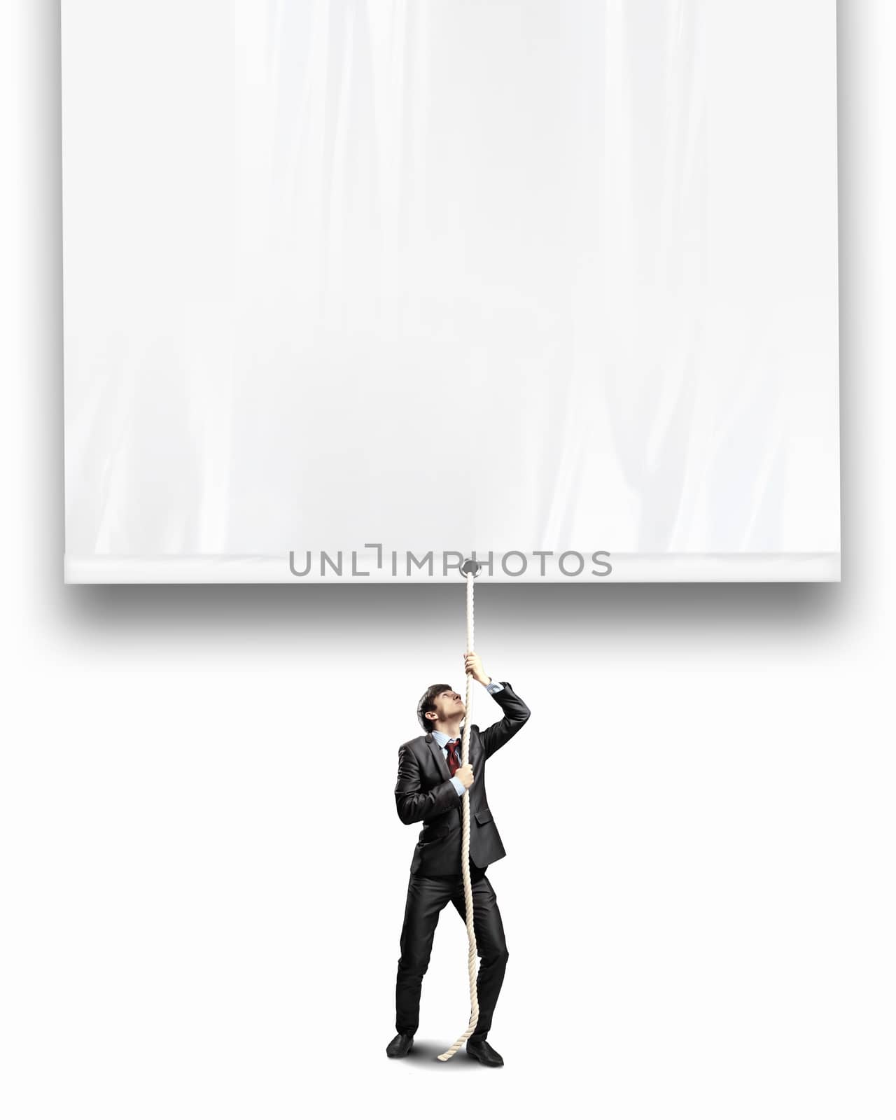 Image of businessman pulling blank banner. Place for text