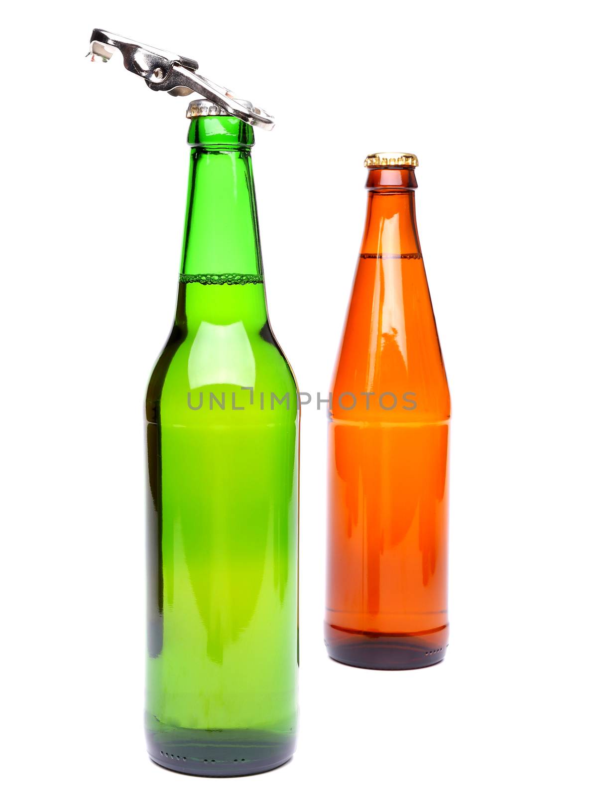 Two bottles of beer and a opener on the white background.