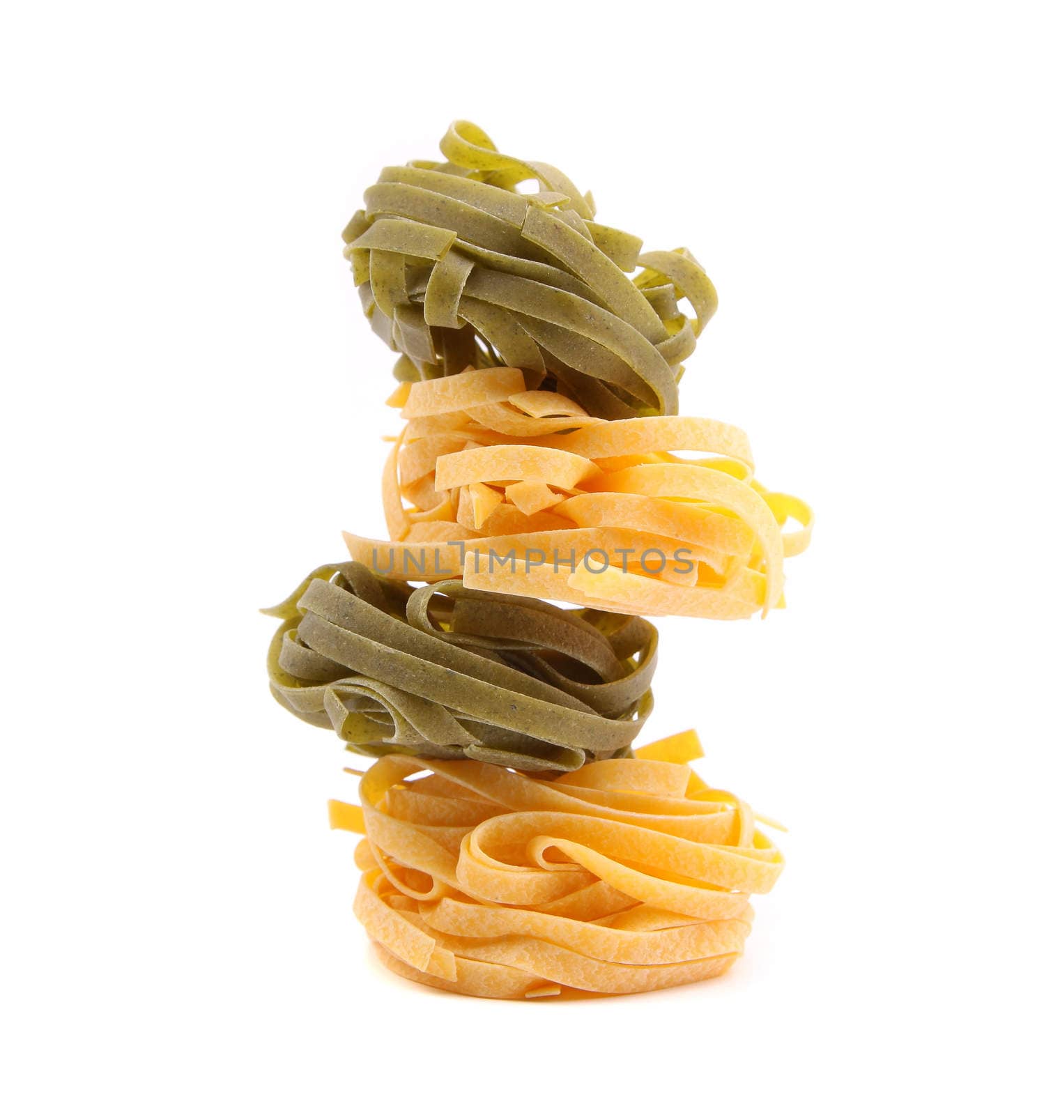 Tagliatelle in two colours, close-up by indigolotos