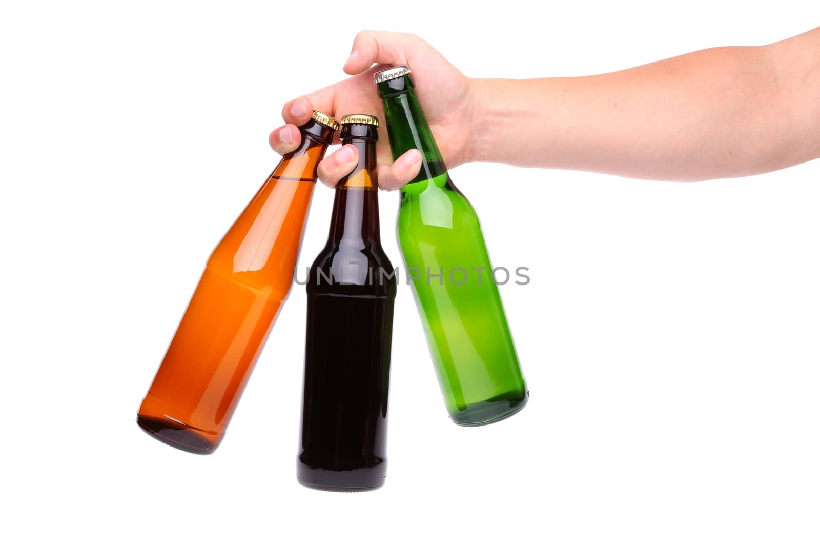Man's hand holding three beer bottle by indigolotos