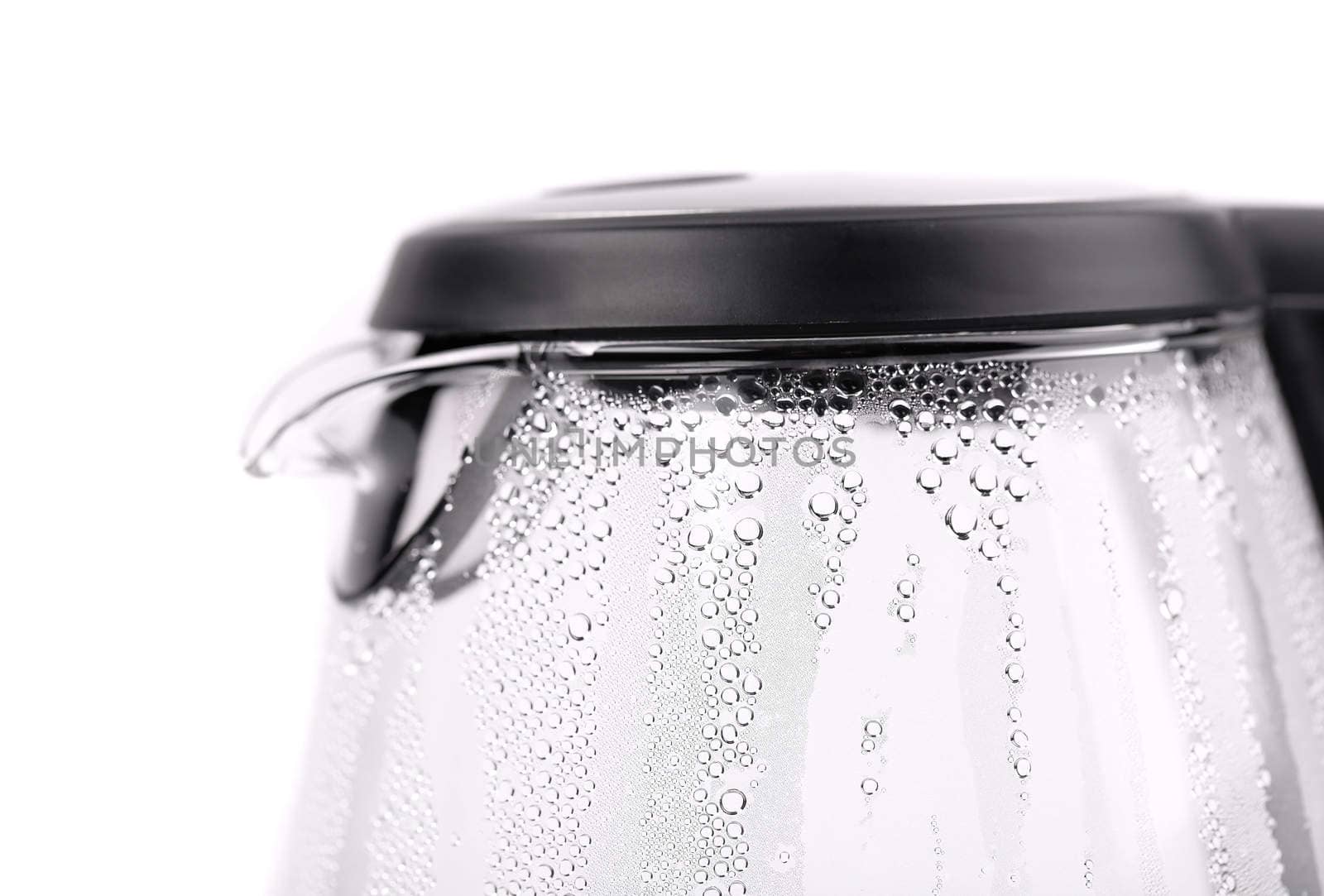 Water boiling in the glass electric kettle. by indigolotos