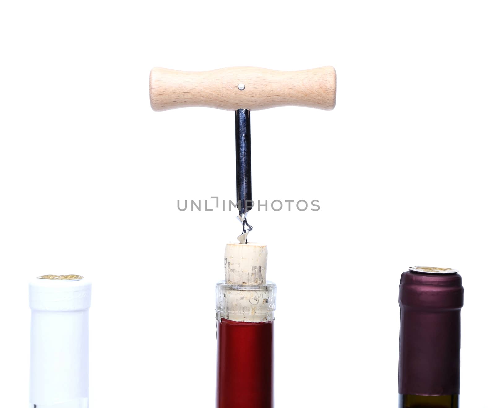 Corkscrew opened and a three wine bottle on a white background