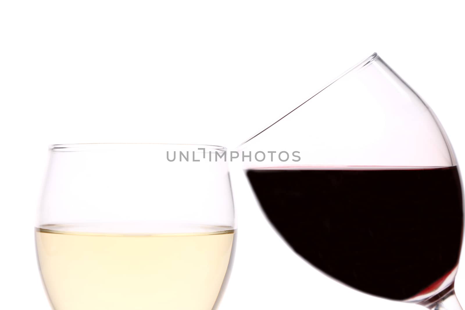 Red and white wine glasses on a white background