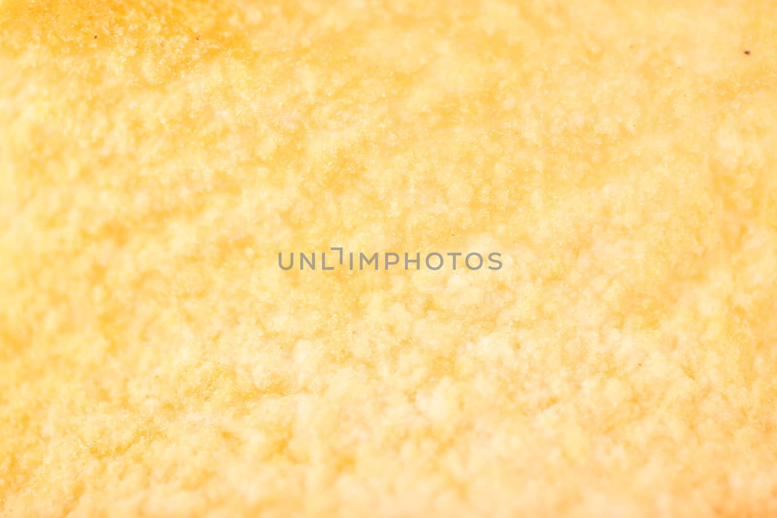 yellow potato chips closeup on whole background