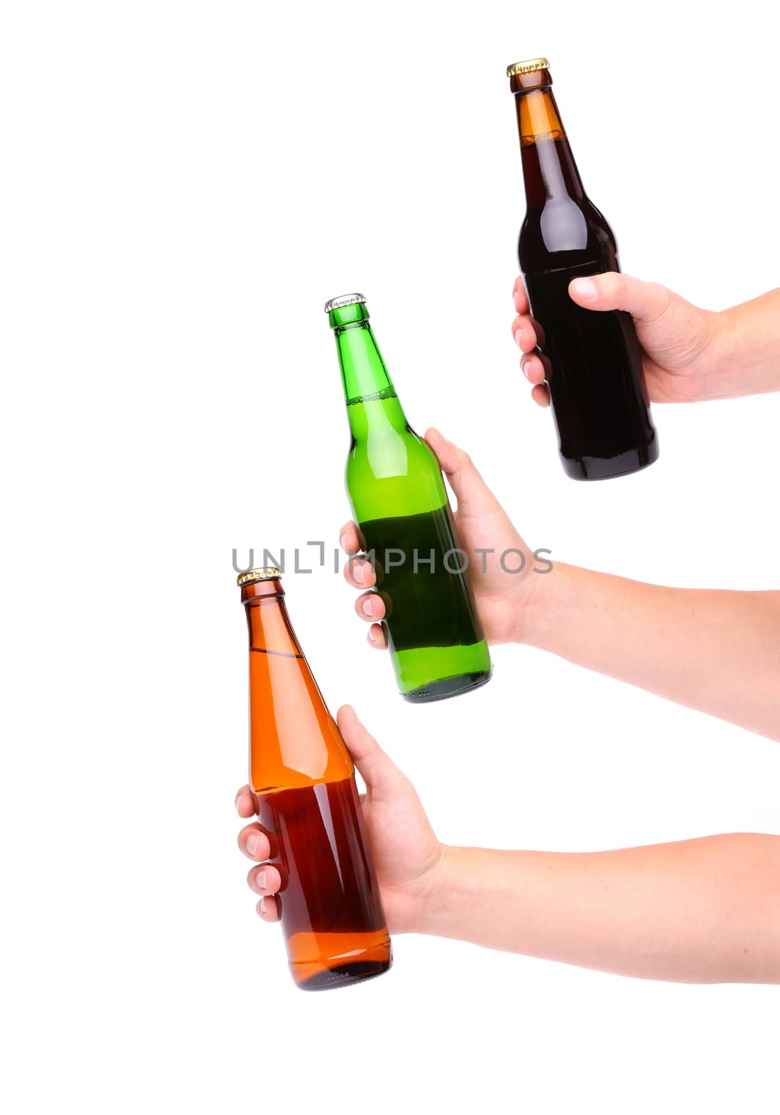 Three beer bottles and three hands isolated on white