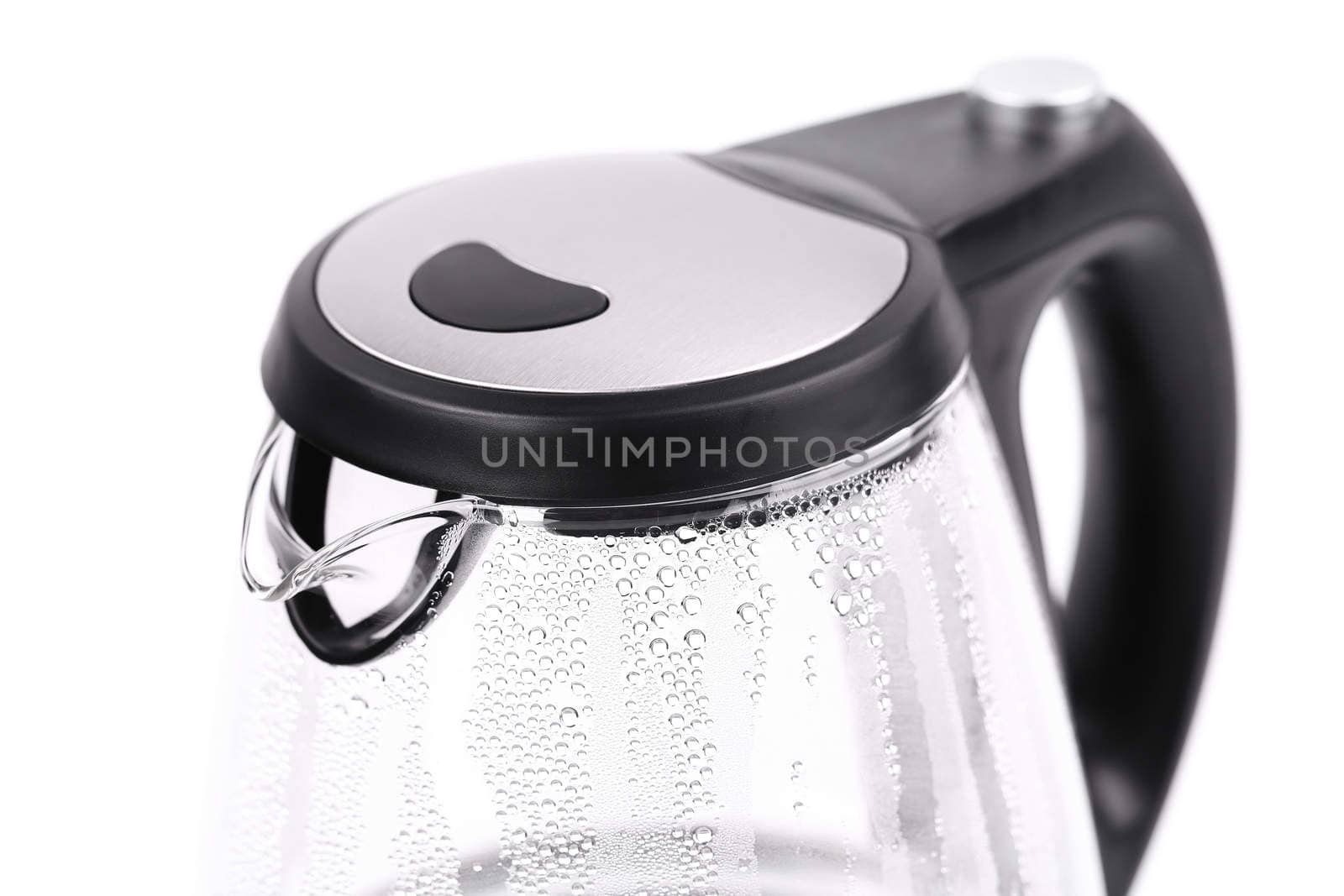 Water boiling in the glass electric kettleon a white background.