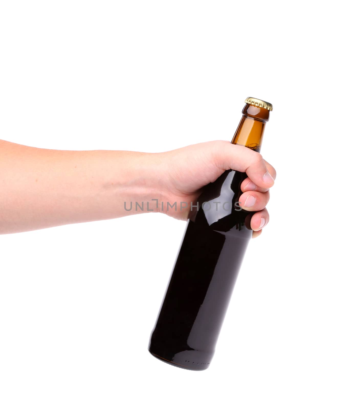 Beer bottle in the hand isolated on white