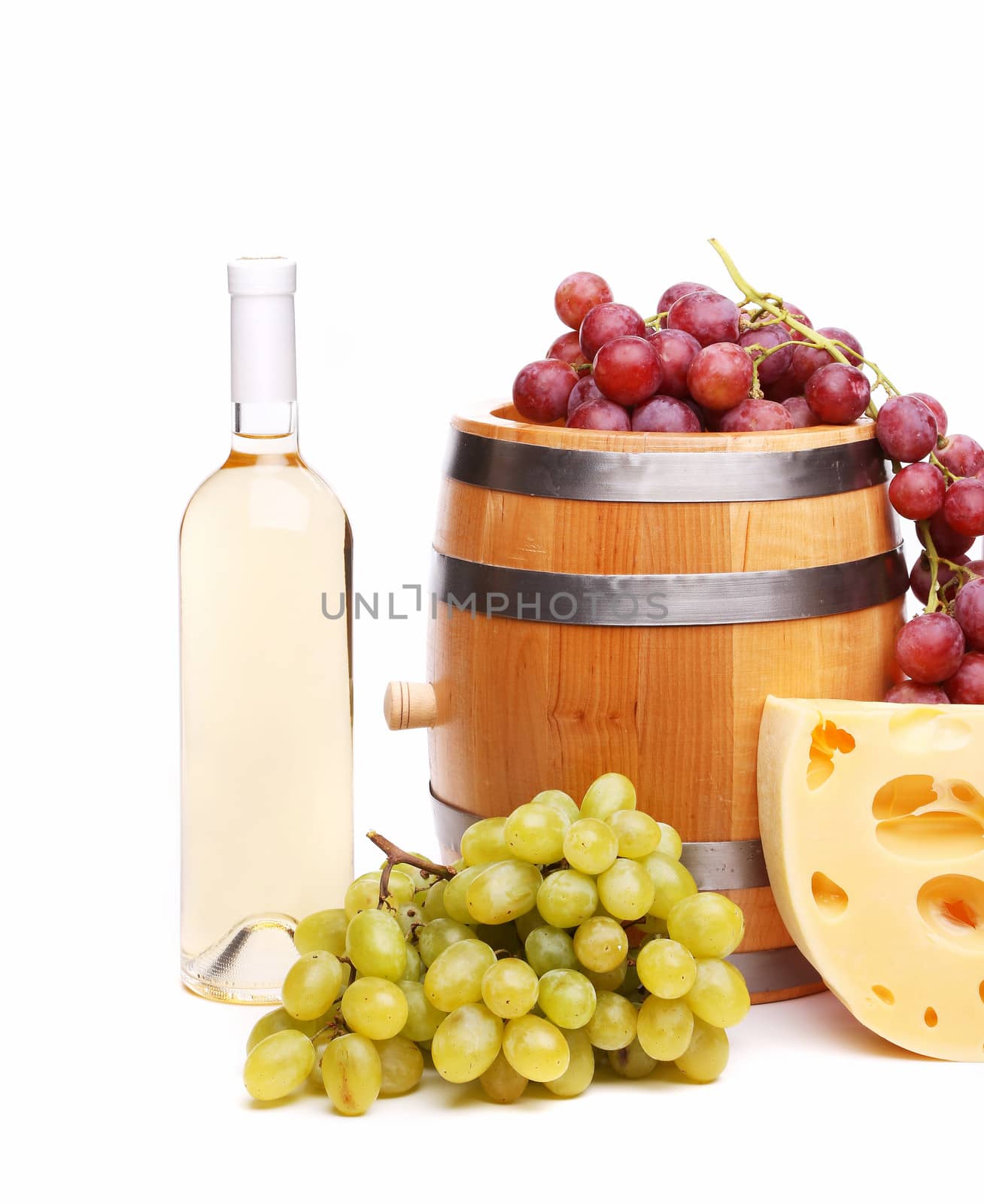 barrel and bottles of wine and ripe grapes isolated on white