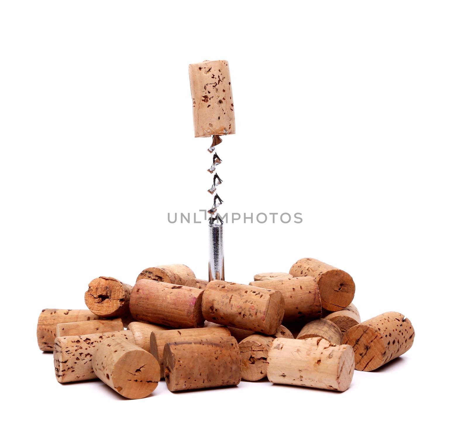 Corkscrew and wine corks on a white background