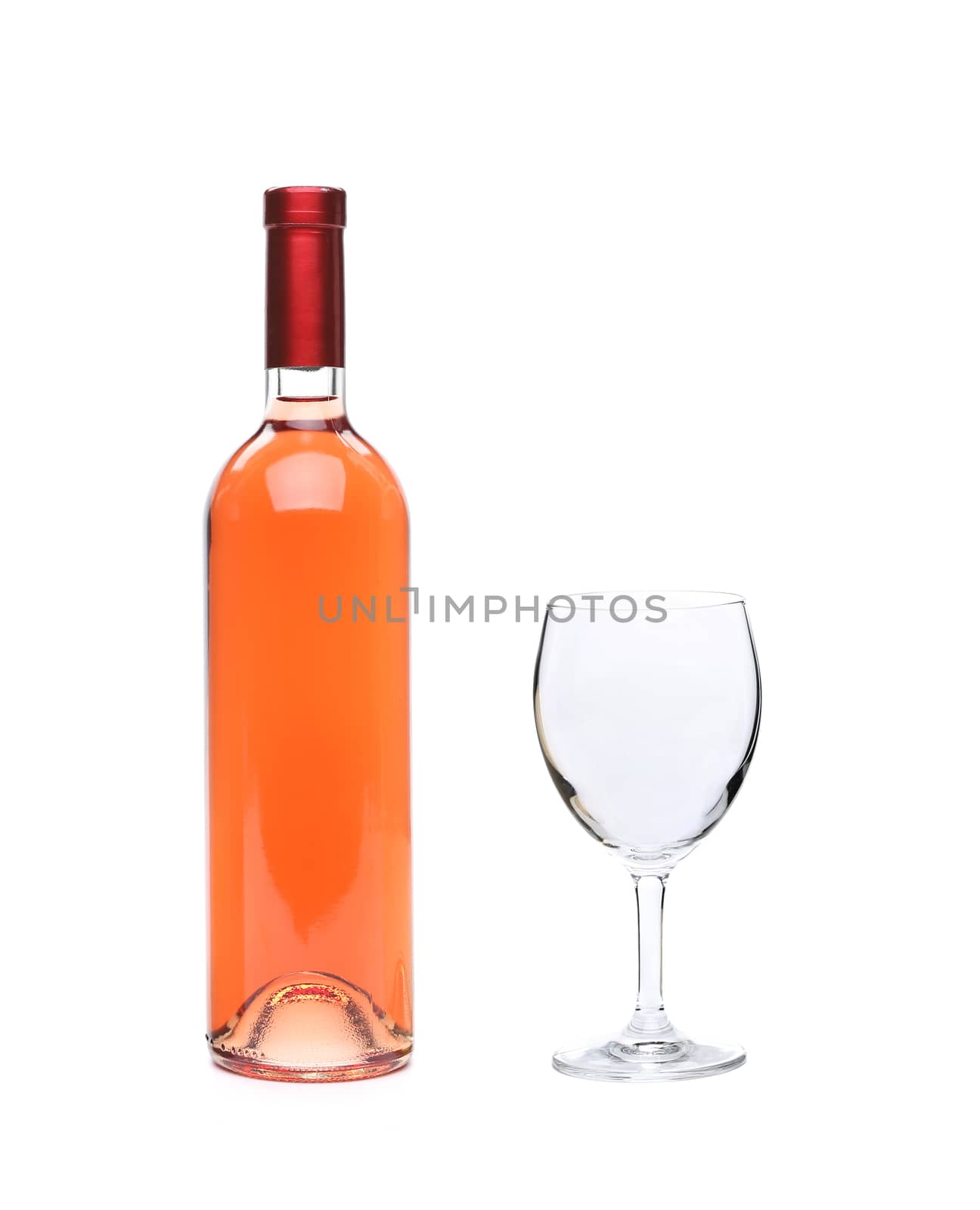 Full pink wine bottle and glass goblet isolated on white background