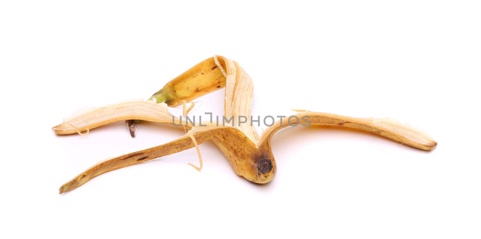 old banana peel on a white background