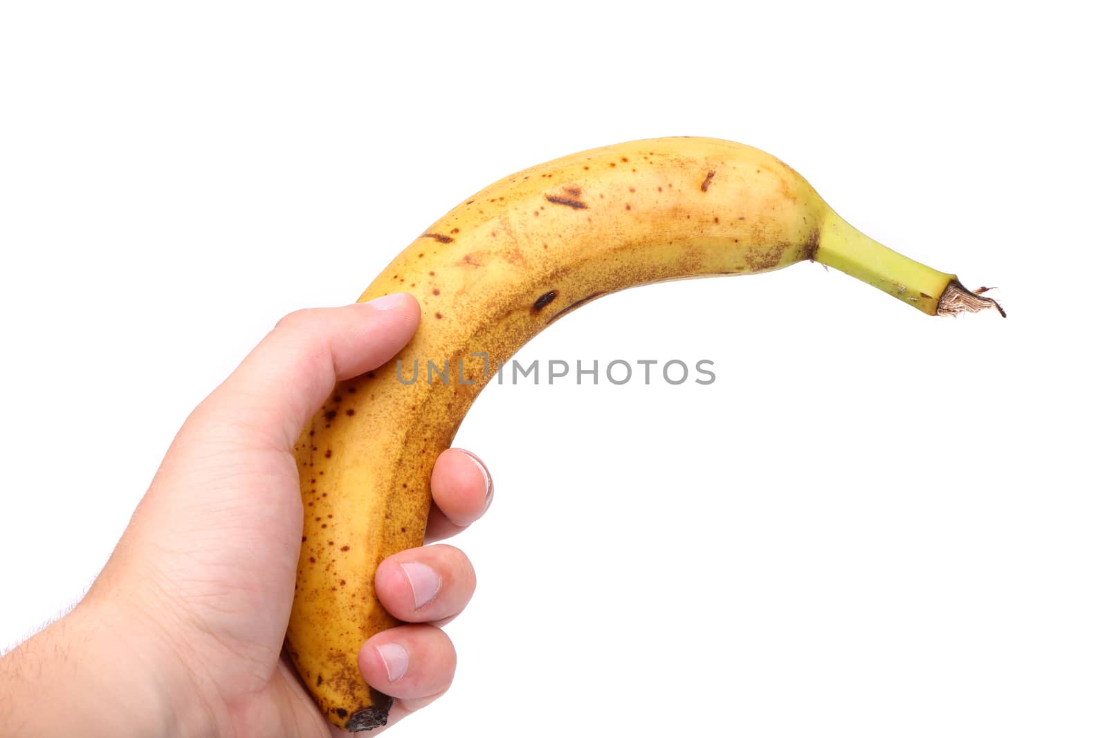 Young hand and old banana on a white background