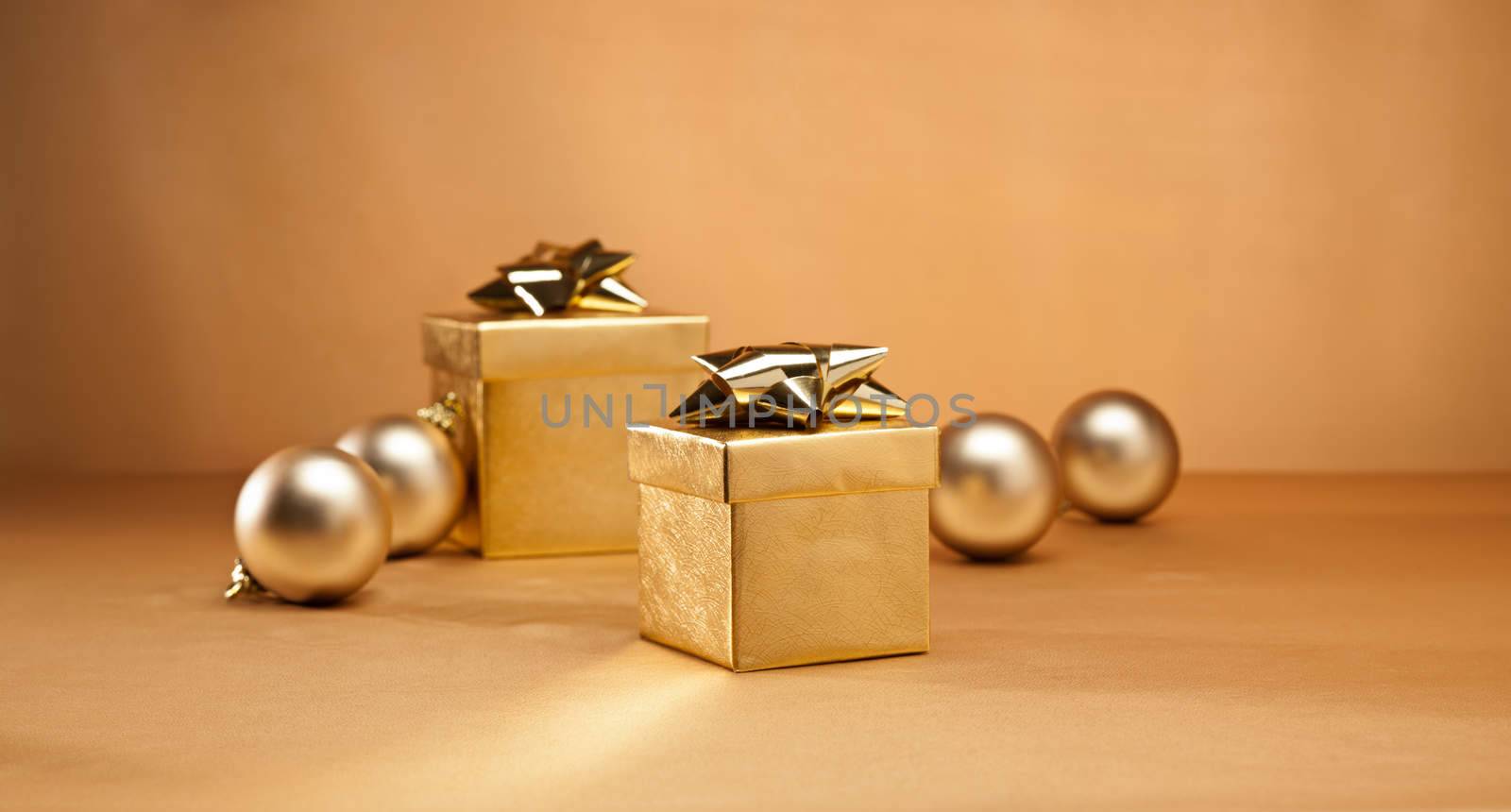 Gold bauble and present by 3523Studio