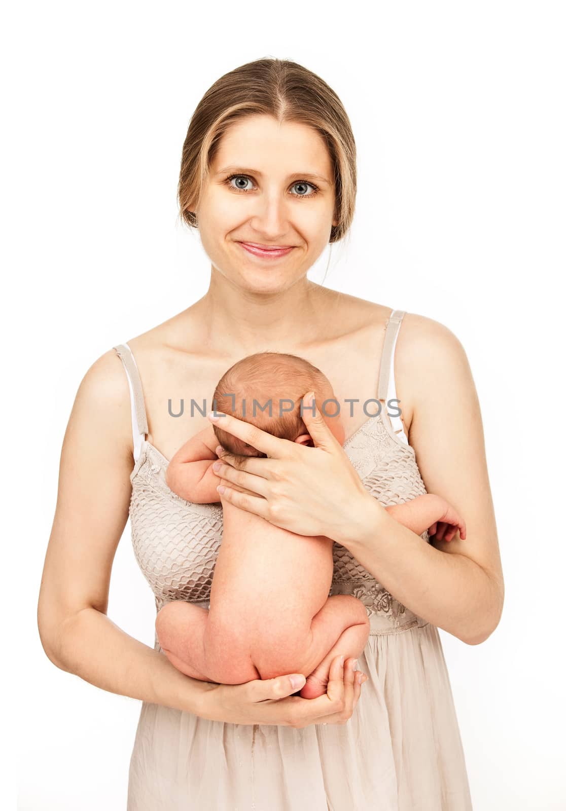 Young Caucasian mother and her newborn baby boy over white