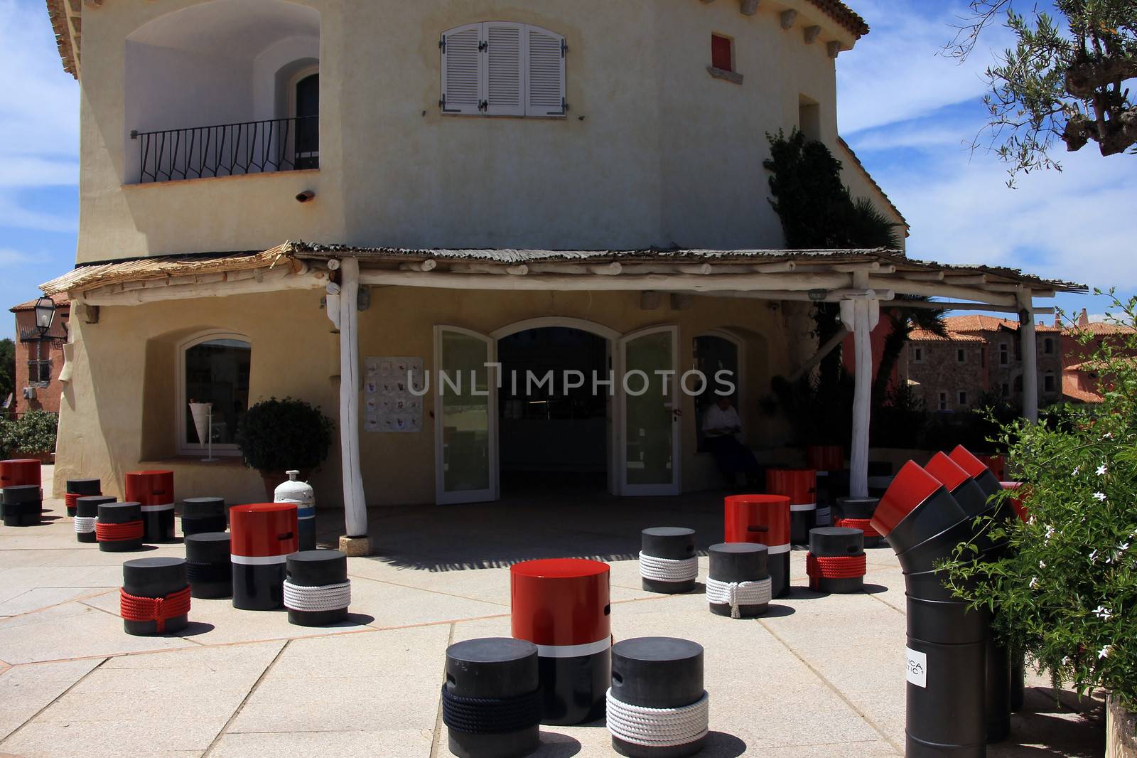 PORTO CERVO, ITALY - JUNE 12: Small restaurant of a luxury resort in the north of Sardinia,  the center of the Emerald Coast  on  June 12, 2013 in Porto Cervo, Italy