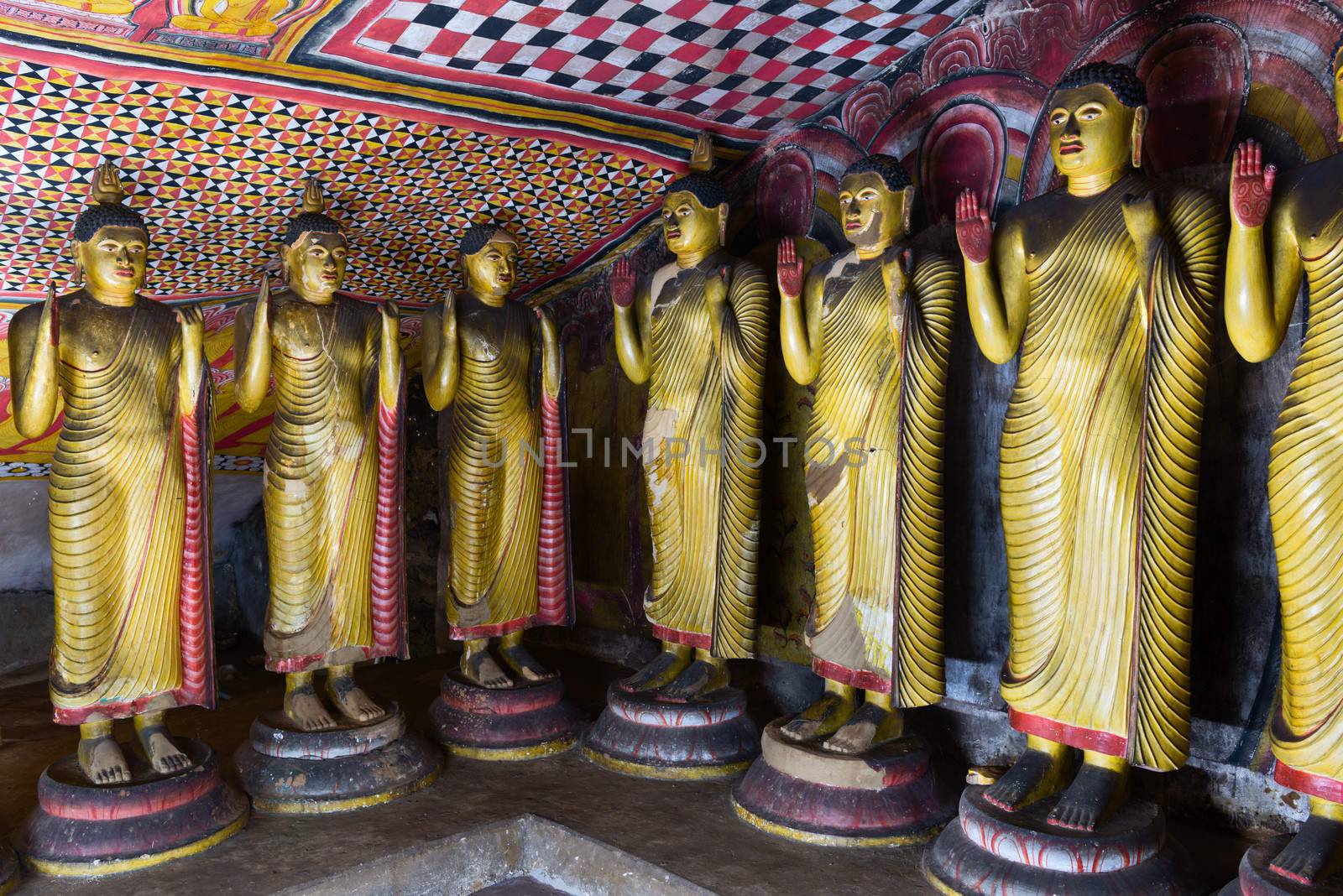 Buddha statues in Dambulla, Sri Lanka by iryna_rasko