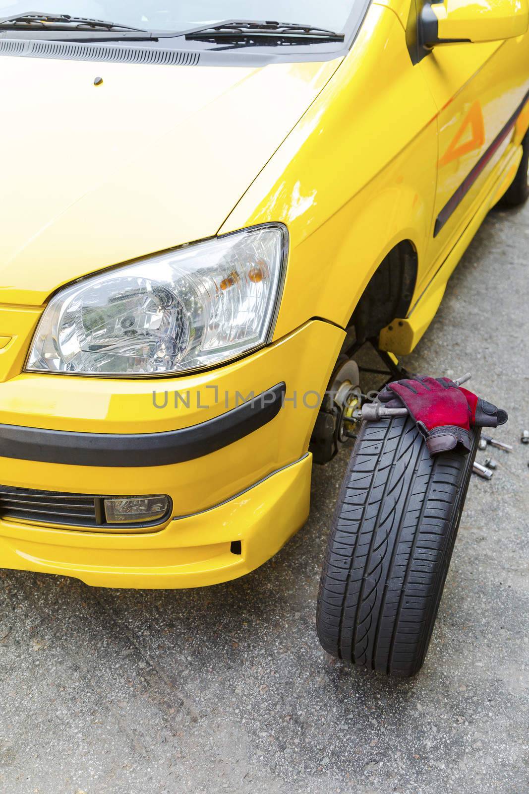 Close up of a breakdown car in the process of repairing. 