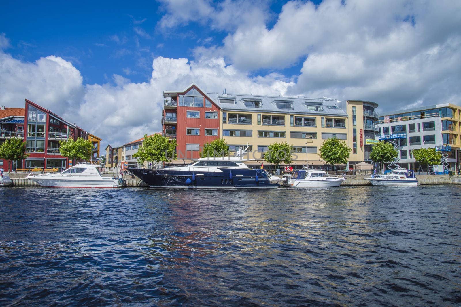 luxury yacht in the harbor of halden, blue charm by steirus