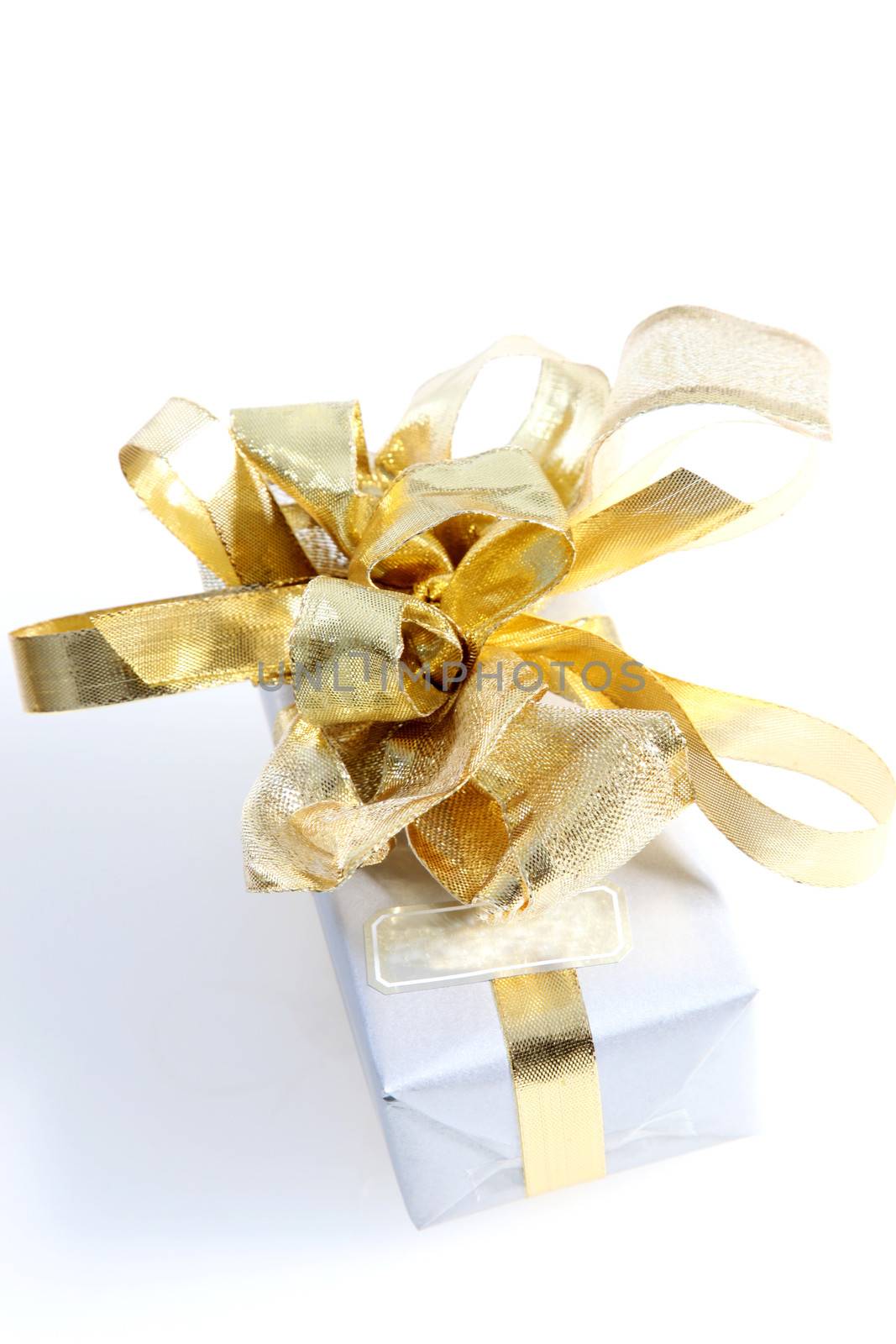 Gift with ornate gold bow by Farina6000