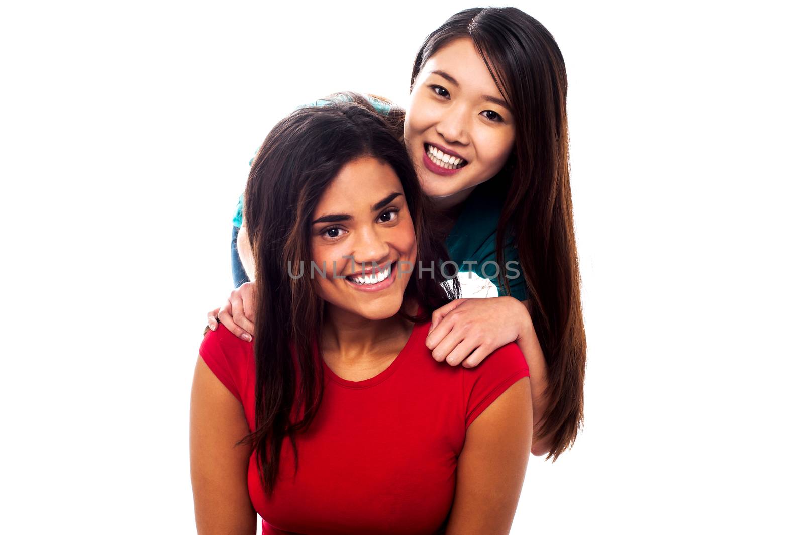 Charming young girls wearing a bright smile on their faces