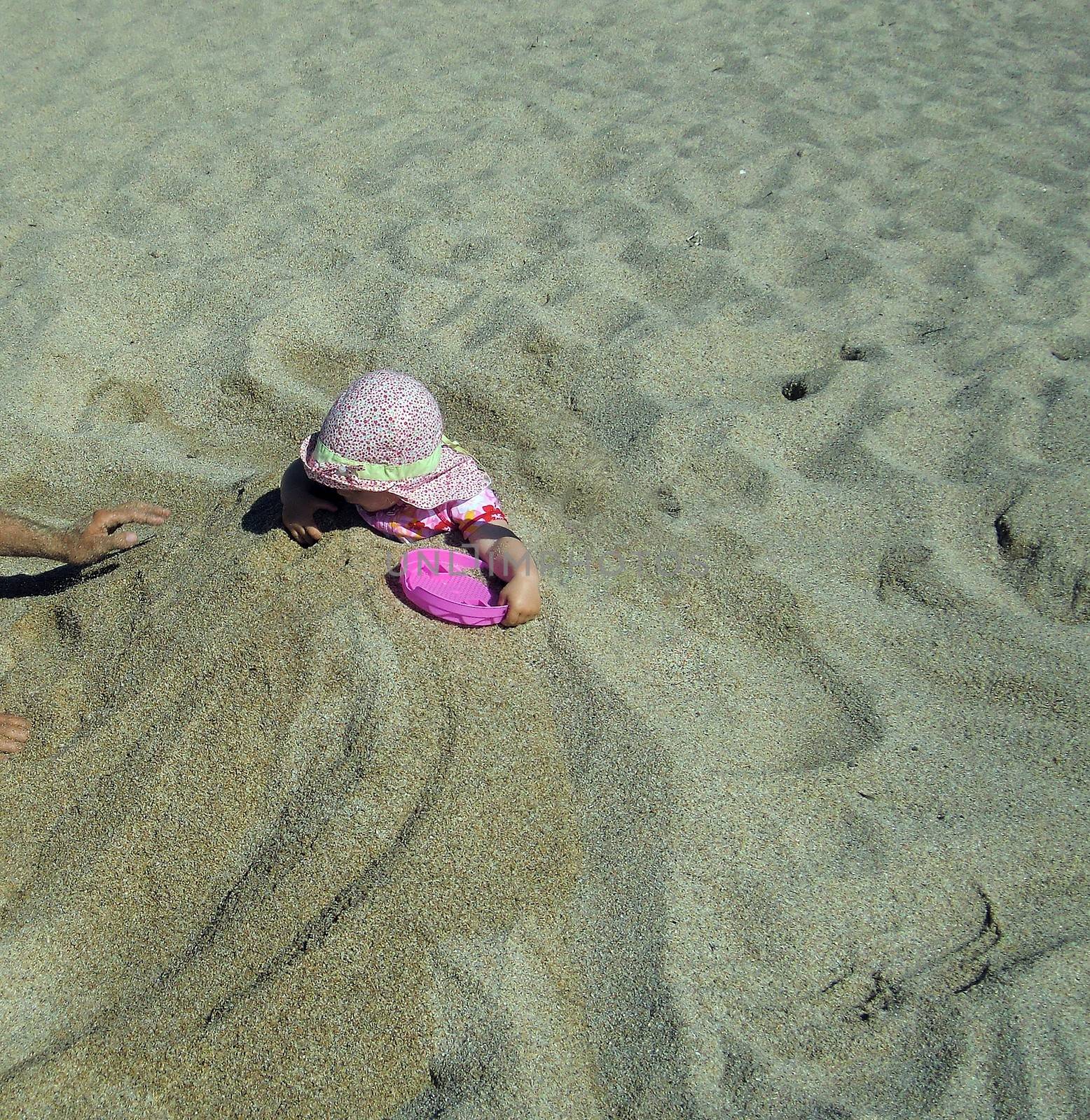 Portrait of little cute blond girl  on the beach by Flik47