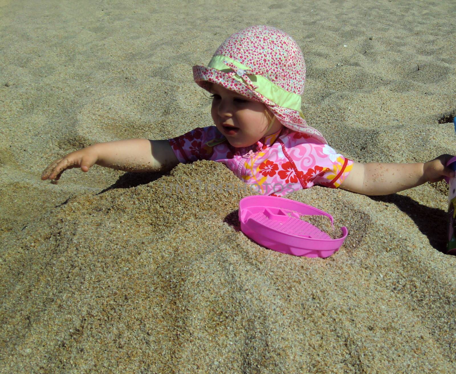 Portrait of little cute blond girl  on the beach by Flik47