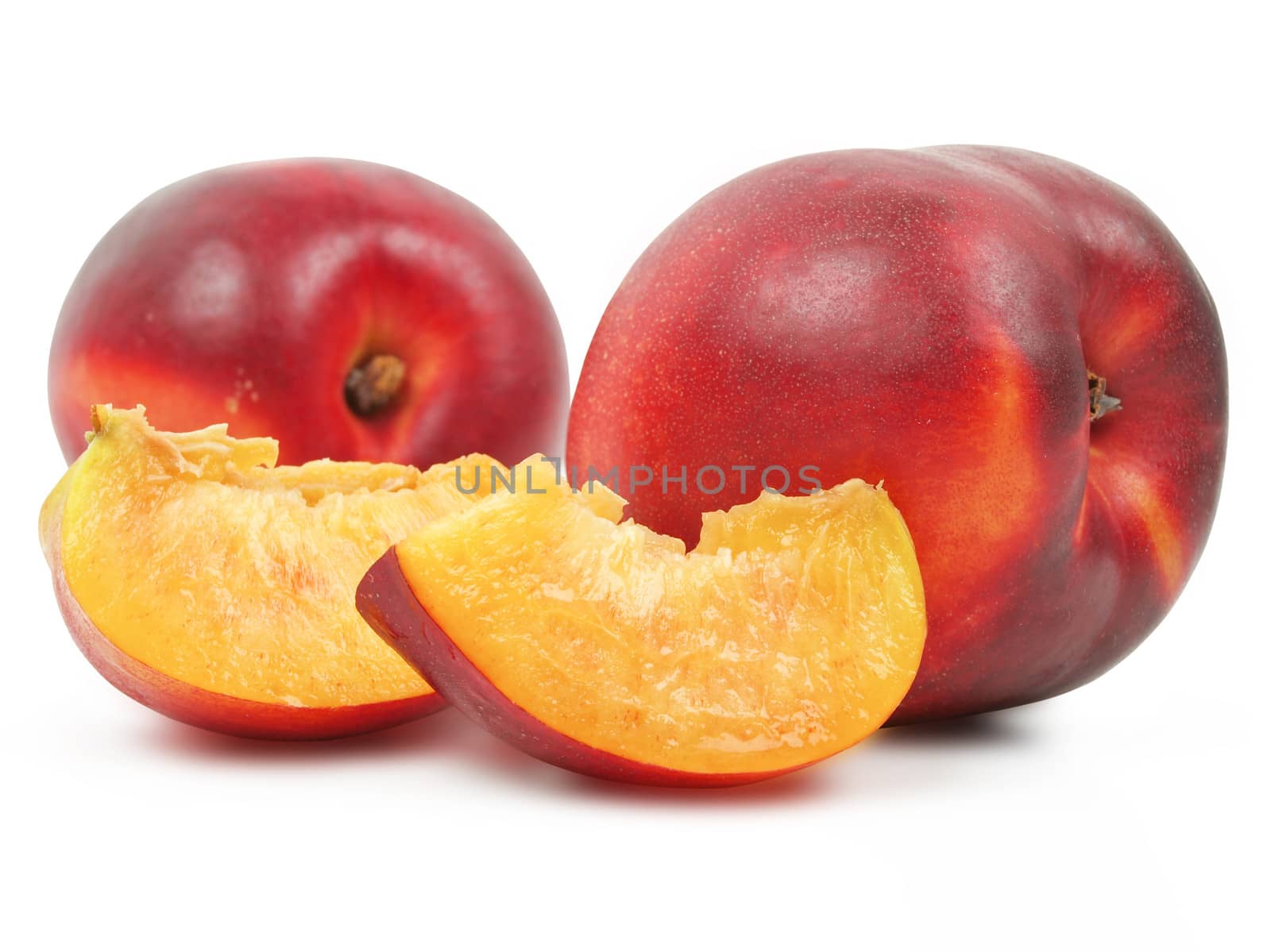 two delicious nectarines over white background