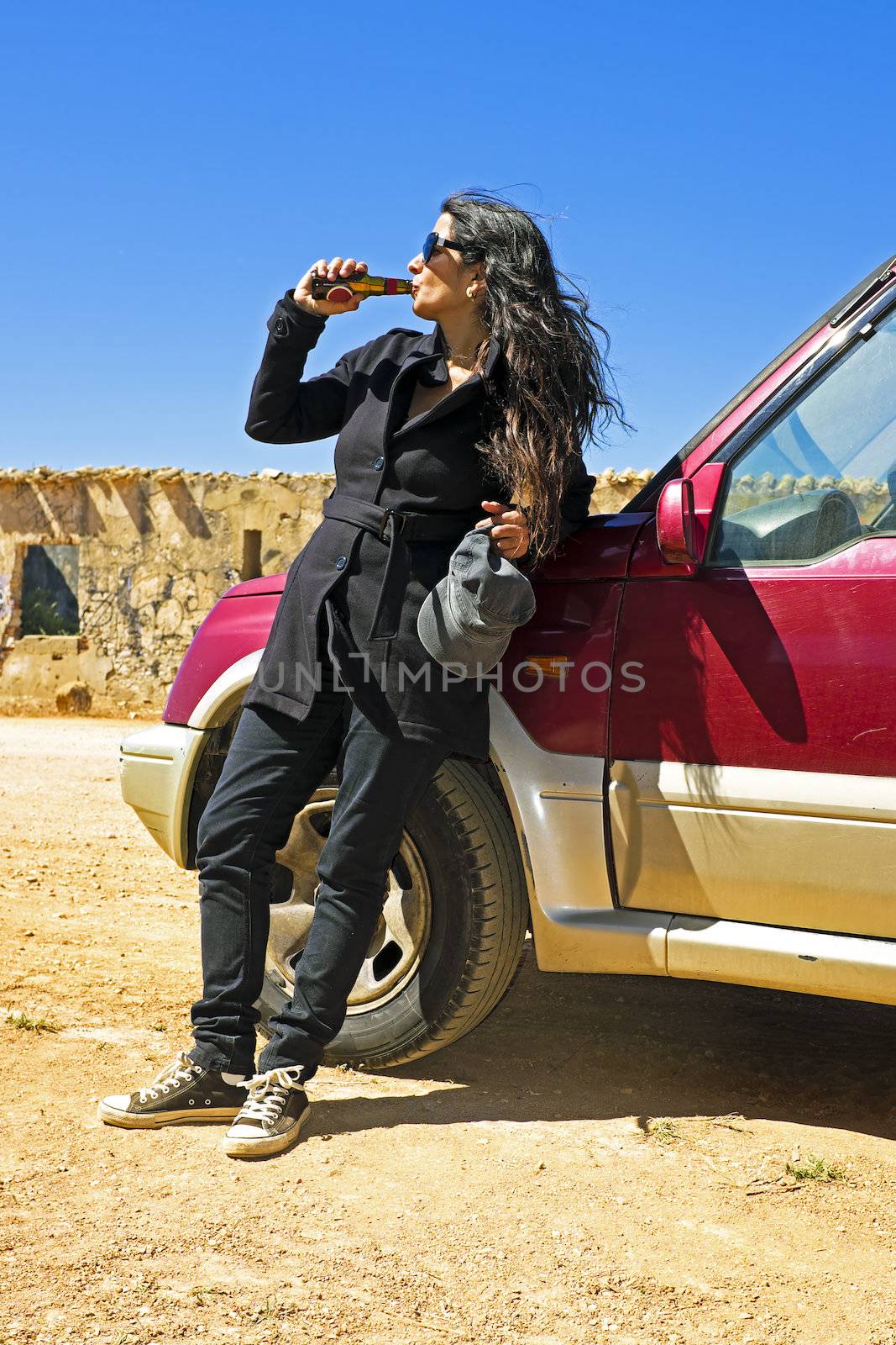 Beautiful woman drinking beer by devy