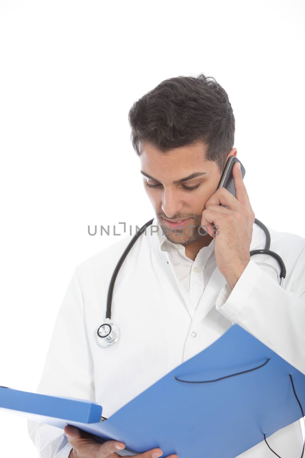 Young male doctor talking on a mobile phone by Farina6000