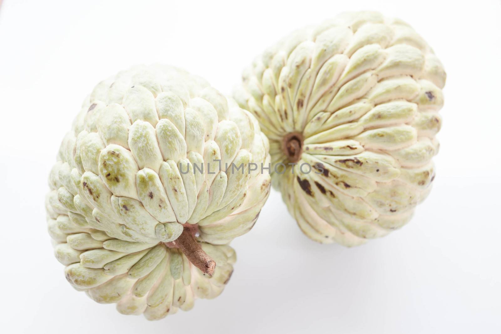 Sweet fruit of custard apple isolated on white background by punsayaporn